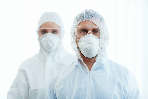 What are the specific steps to polish and wax a UK car to prevent paint damage?